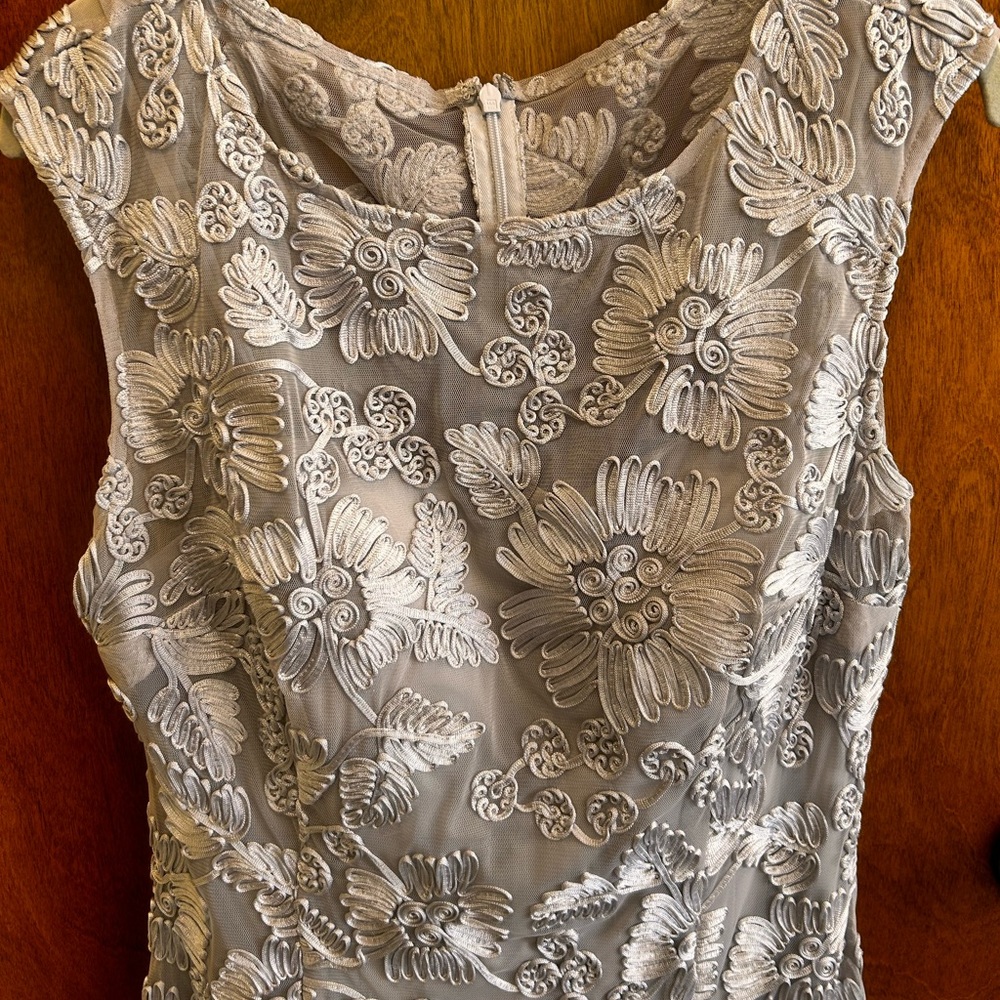 Lovely silver mother of the bride dress with ribbon detail